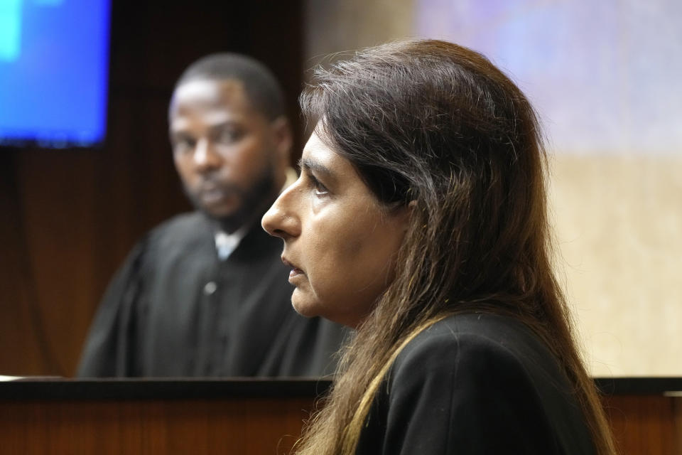 Dr. Fariha Qadir is questioned by Attorney Paulette Michel Loftin in court, Friday, July 28, 2023, in Pontiac, Mich. Prosecutors are making their case that the Michigan teenager, Ethan Crumbley, should be sentenced to life in prison for killing four students at his high school in 2021. Prosecutors introduced dark journal entries written by Crumbley, plus chilling video and testimony from a wounded staff member. (AP Photo/Carlos Osorio)