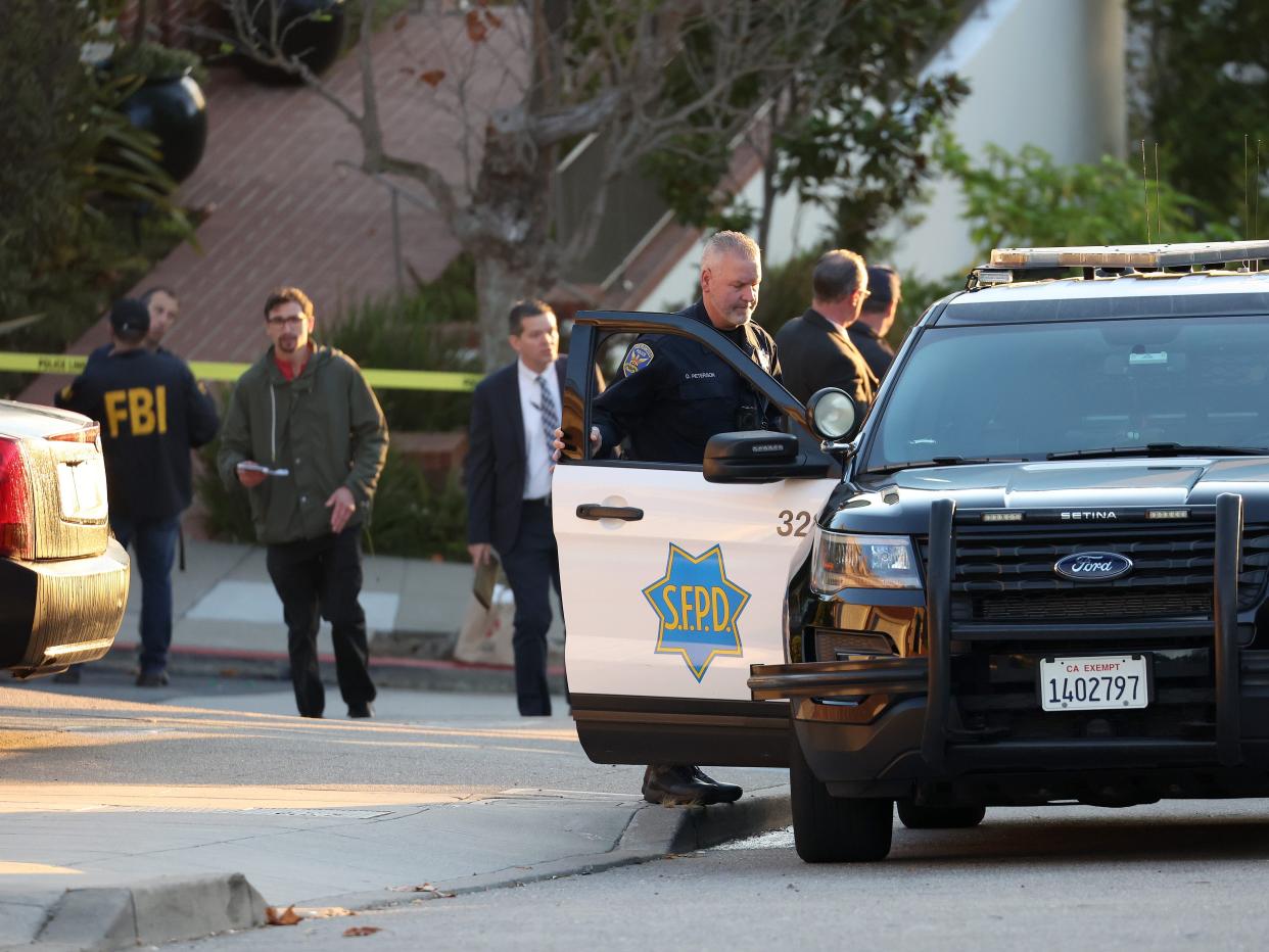 San Francisco police officers and F.B.I. agents gather in front of the home of U.S. Speaker of the House Nancy Pelosi (D-CA) on October 28, 2022 in San Francisco, California.