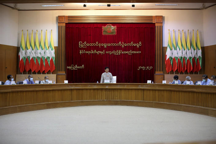Union Election Commission Chairman Thein Soe, center, speaks during a meeting with representatives of various political parties Friday, May 21, 2021 in Naypyitaw, Myanmar. The head of Myanmar's military-appointed state election commission said Friday his agency will consider dissolving the former ruling party of Aung San Suu Kyi for its alleged involvement in electoral fraud, and have its leaders charged with treason. (AP Photo)