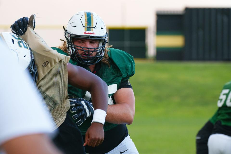 Senior offensive lineman James Durand practices with Basha High School of Chandler, Arizona, in October.