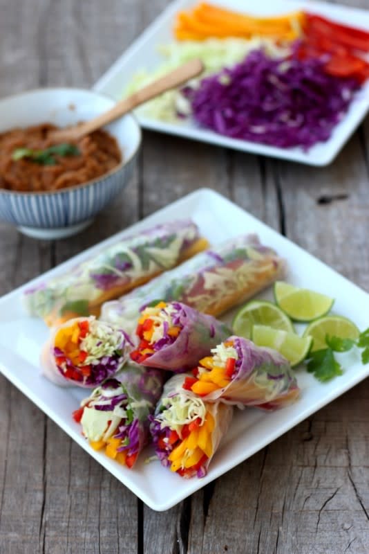 Dish by Dish<p>Crunchy vegetables wrapped in a thin, translucent rice paper wrapper, served alongside with a thick and chunky spicy peanut sauce...finger-licking good!</p><p><strong>Get the recipe: <a href="http://dishbydish.net/2014/11/24/rainbow-vegetable-rolls-spicy-peanut-sauce/" rel="sponsored" target="_blank" data-ylk="slk:Rainbow Vegetable Rolls with Spicy Peanut Sauce;elm:context_link;itc:0;sec:content-canvas" class="link "><em>Rainbow Vegetable Rolls with Spicy Peanut Sauce</em></a></strong></p>