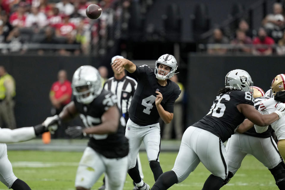 Las Vegas Raiders quarterback Aidan O'Connell (4) throws the ball against the San Francisco 49ers during the first half of an NFL preseason football game, Sunday, Aug. 13, 2023, in Las Vegas. (AP Photo/John Locher)