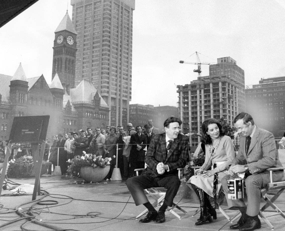 Canadian communications specialist Marshall McLuhan (left) is interviewed in Nathan Phillips Square in Canada by commentator Barbara Walters and Hugh Downs, host of “The Today Show” in this file photo from Sept. 18, 1970.