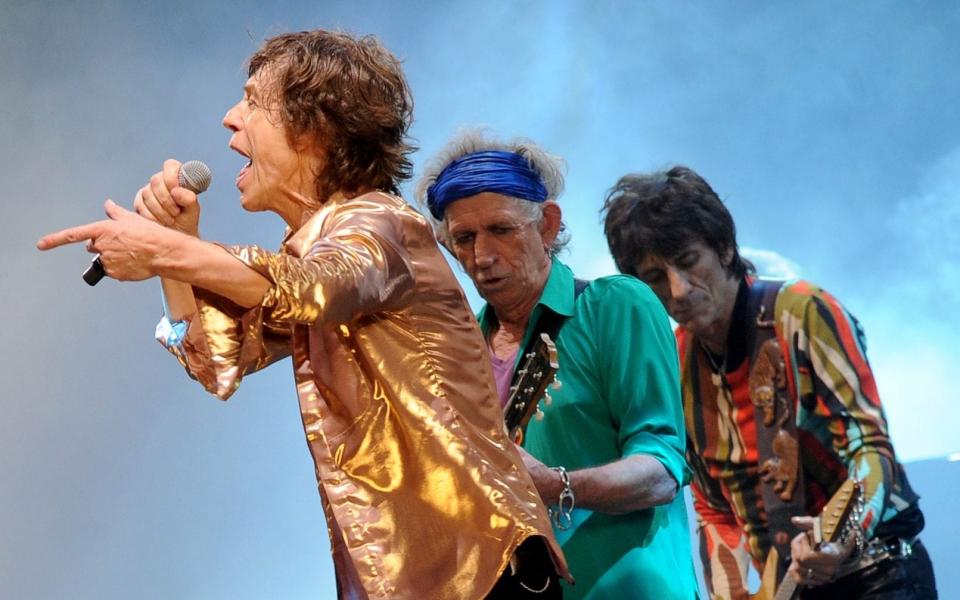 Rolling Stones Mick Jagger, Keith Richards and Ronnie Wood performing at the 2013 Glastonbury Festival - PA