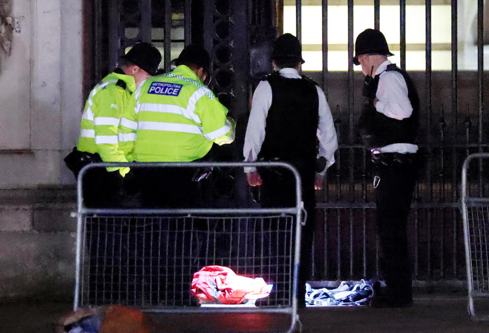 Police at the scene outside Buckingham Palace after a man was arrested and a subsequent controlled explosion was carried out on May 2, 2023 in London, England. / Credit: Belinda Jiao/Getty Images