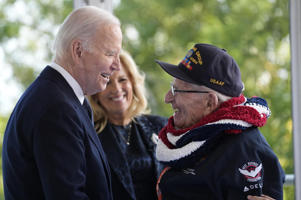 President Joe Biden and first lady Jill Biden, greet a World War II veteran during ceremonies to mark the 80th anniversary of D-Day, Thursday, June 6, 2024, in Normandy. (AP Photo/Evan Vucci)