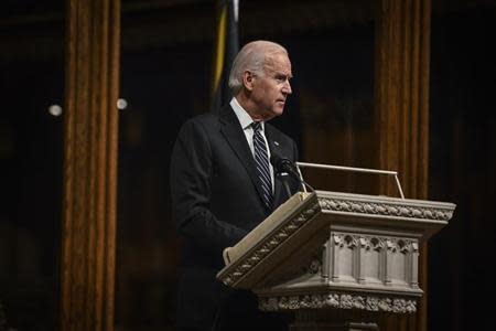 U.S. Vice President Joe Biden delivers remarks at a memorial service for Nelson Mandela at the National Cathedral in Washington December 11, 2013. REUTERS/James Lawler Duggan