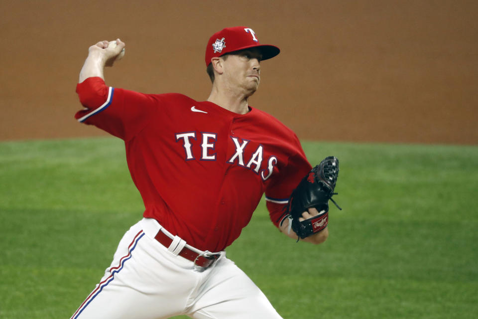 Texas Rangers starting pitcher Kyle Gibson throws during the first inning of a baseball game against the Los Angeles Dodgers in Arlington, Texas, Sunday, Aug. 30, 2020. (AP Photo/Roger Steinman)