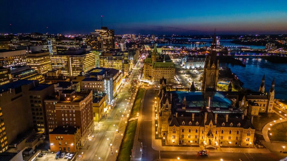 The West Block of Parliament Hill and Wellington Street in downtown Ottawa in a drone photo from April 2023.