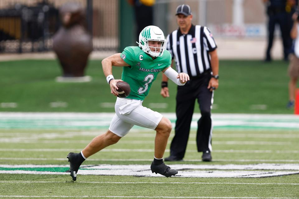 North Texas quarterback Stone Earle (3) carries the ball during the first half against California on Sept. 2 in Denton. Earle played two seasons (2020-21) for Abilene Christian before transferring to North Texas. The Mean plays ACU at 6 p.m. Saturday in a non-conference game in Denton.