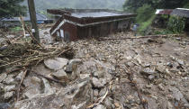 A house hit by a landslide caused by heavy rain in Namwon, South Korea, Saturday, Aug. 8, 2020. (Kim Dong-chul/Yonhap via AP)