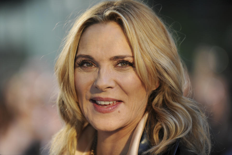 Actress Kim Cattrall arrives at the red carpet before a screening on "The Grand Seduction" at Roy Thomson Hall during the 38th Toronto International Film Festival in Toronto September 8, 2013.   REUTERS/Jon Blacker (CANADA - Tags: ENTERTAINMENT)