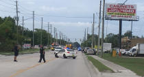 <p>Police work near the scene of a shooting where they said there were multiple fatalities in an industrial area near Orlando, Fla., Monday, June 5, 2017. (Jacob Langston/Orlando Sentinel via AP) </p>