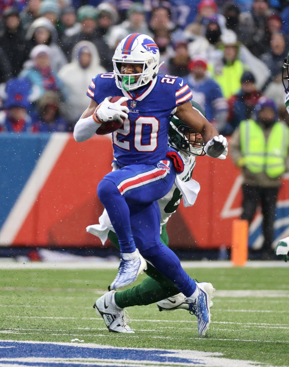 Bills running back Nyheim Hines looks for running room against the Jets. 