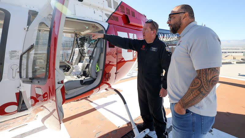 Cory Cox, University of Utah Health AirMed flight paramedic, shows Bill Schuffenhauer, Olympic silver medalist in bobsledding and Whole Blood Titan donor, the inside of an AirMed helicopter during a press conference to announce ARUP Blood Services’ new Whole Blood Titan program for Type O blood donors at the University of Utah Hospital helipad in Salt Lake City on Wednesday, Oct. 18, 2023. This will allow the donor’s whole blood to be used instead of the current practice of breaking it down into three component parts.