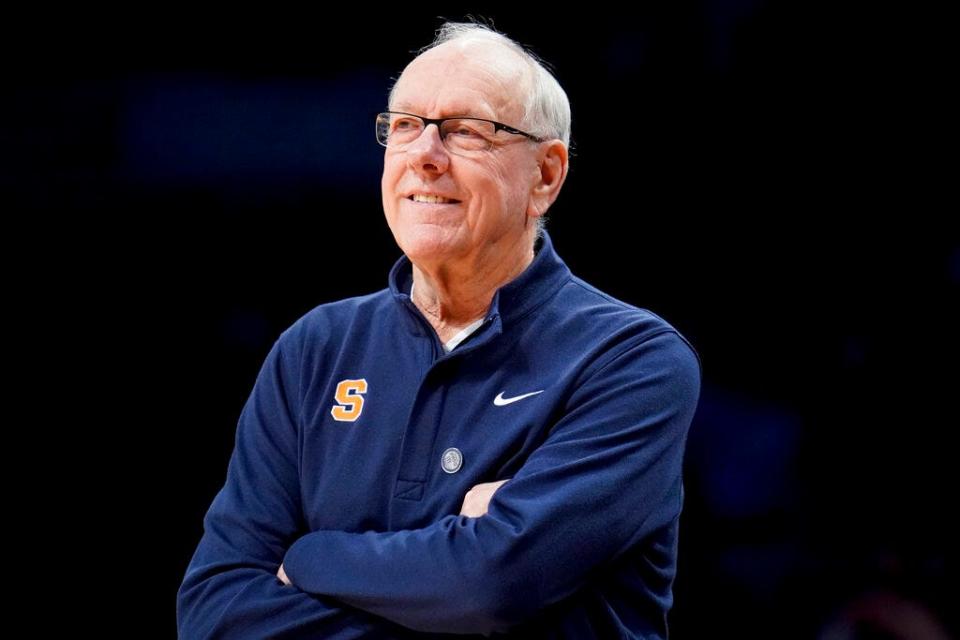 Syracuse head coach Jim Boeheim smiles in the second half of an NCAA college basketball game against Florida State during the Atlantic Coast Conference men's tournament, Wednesday, March 9, 2022, in New York. (AP Photo/John Minchillo)