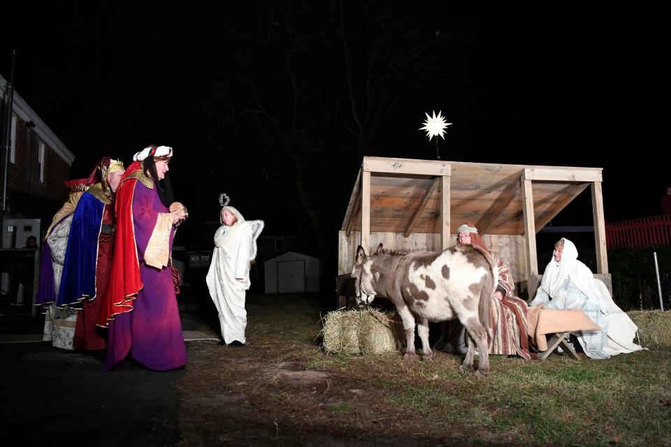 The three wise men approach Mary and Joseph with gifts during the "Living Nativity" performance on Sunday, Dec. 9, 2018 in Lyndhurst. 