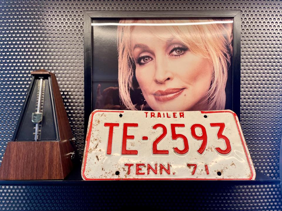 Dolly Parton’s face beams from a photograph on the wall of 303 at Backstage at The Verb Hotel.