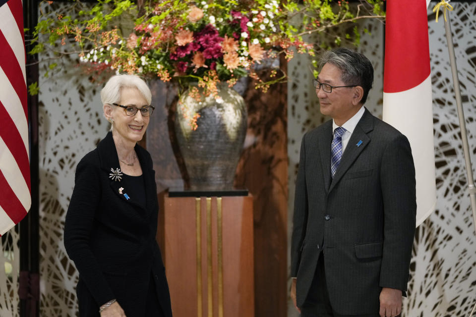 U.S. Deputy Secretary of State Wendy Sherman, left, and her counterpart, Japanese Vice Foreign Minister Takeo Mori pose for a photo before their meeting at the Iikura guesthouse in Tokyo, Tuesday, Oct. 25, 2022. (AP Photo/Hiro Komae)