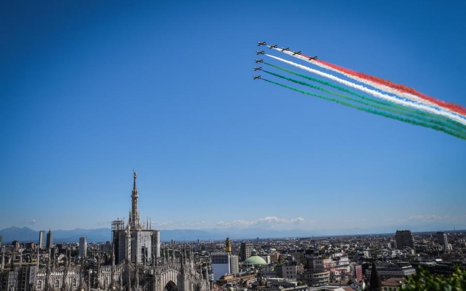 The aerobatic demonstration team of the Italian Air Force, flies in formation above Milan, 25 May 2020. Starting from 25 May, the Frecce Tricolori will perform every day throughout Italy as part of the 74th anniversary celebrations of the founding of the Italian Republic and to pay homage to the areas most affected by the coronavirus pandemic - Shutterstock