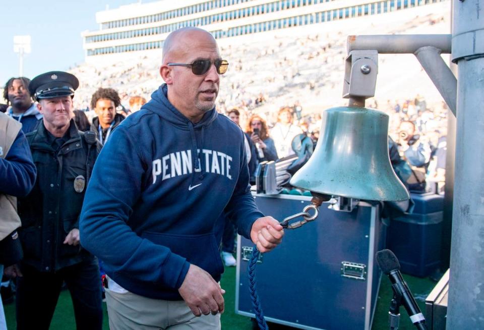 Penn State football coach James Franklin rings the victory bell after the win over Rutgers on Saturday, Nov. 18, 2023.