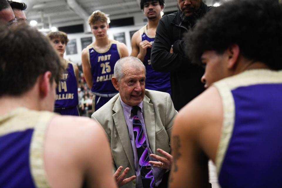 Fort Collins head coach Bruce Dick speaks to the team during a timeout in a boys high school basketball game against Fossil Ridge at Fossil Ridge High School on Tuesday, Jan. 31, 2023 in Fort Collins, Colo.