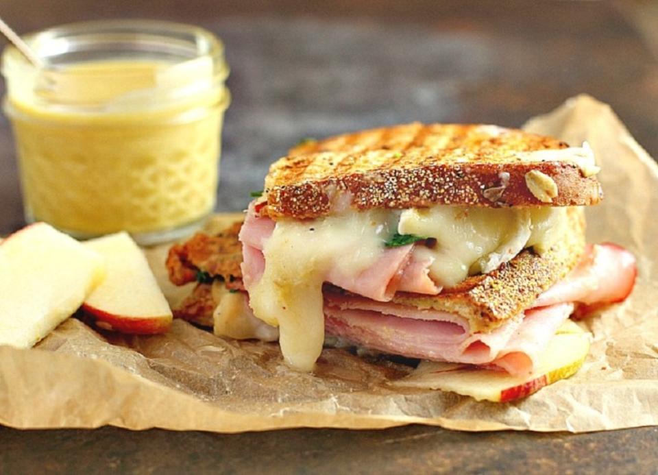 <p>A Dish of Daily Life</p><p>This Ham, Brie, Apple and Spinach Panini with Homemade Honey Mustard is a delicious combination of flavors for gourmet sandwich lovers everywhere.</p><p><strong>Get the recipe: </strong><a href="https://www.adishofdailylife.com/2017/04/ham-brie-apple-spinach-panini-honey-mustard/" rel="nofollow noopener" target="_blank" data-ylk="slk:Ham, Brie, Apple and Spinach Panini with Honey Mustard;elm:context_link;itc:0;sec:content-canvas" class="link "><strong>Ham, Brie, Apple and Spinach Panini with Honey Mustard</strong></a></p>