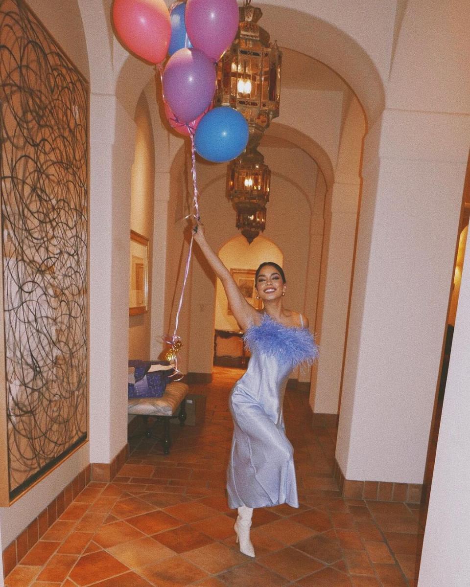 Vanessa Hudgens Celebrates Her Birthday in a Feathery Blue Dress