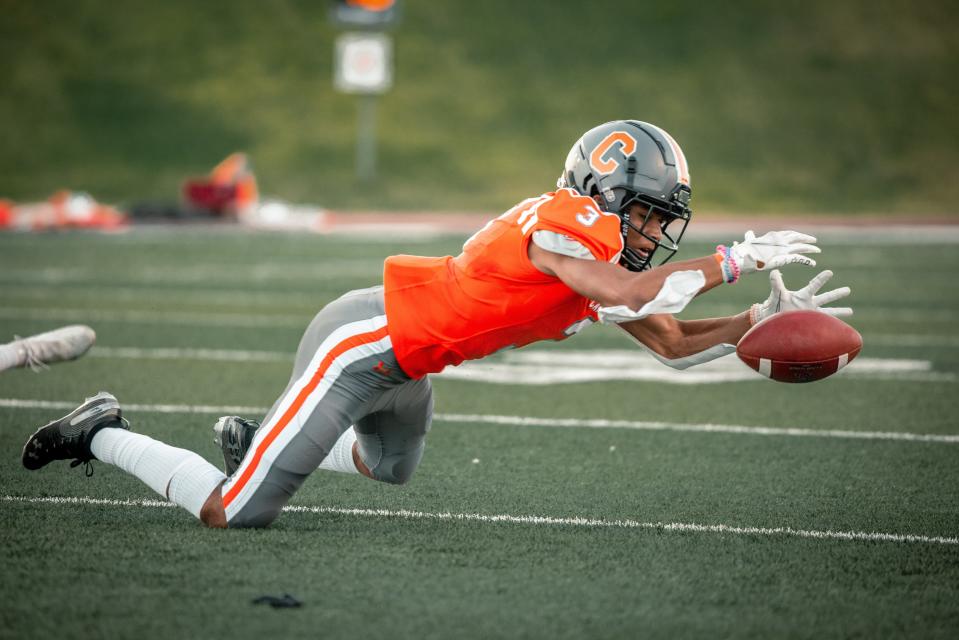 Caprock's Aaron Acosta-Lewis attempts to corral the football during a nondistrict game Thursday, Aug. 27, 2021 against Hereford at Dick Bivins Stadium in Amarillo.