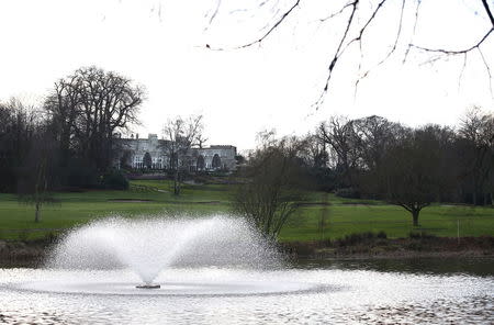 A lake with a fountain is seen by a fairway at the Wentworth Club in Virginia Water, Britain, January 8, 2016. REUTERS/Peter Nicholls