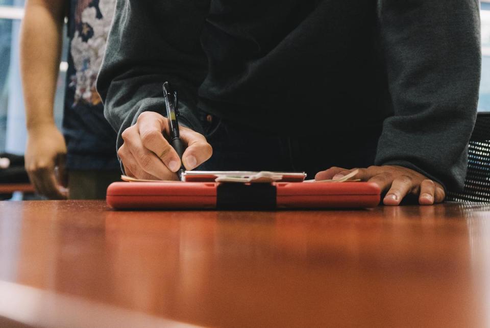 Mihir Relan, 18, Vice President of DeBakey Civic’s Club, registers to vote with the help of Jolt Initiative, a non-profit organization that increases the civic participation of Latinos in Texas, on Friday, April 5, 2024.