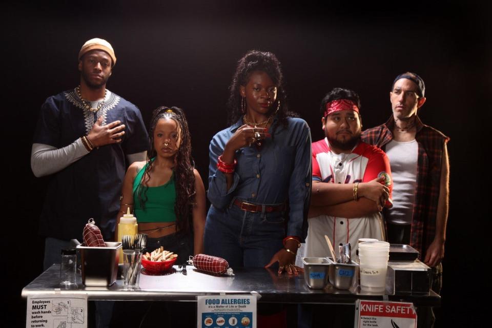 Jasmyn Ackah, center, as the title character in Lynn Nottage’s “Clyde’s” produced by the FSU/Asolo Conservatory, with, from left, Ibukun Omotowa, Ashley McCauley Moore, Jonathan Acosta and Brian Zane.