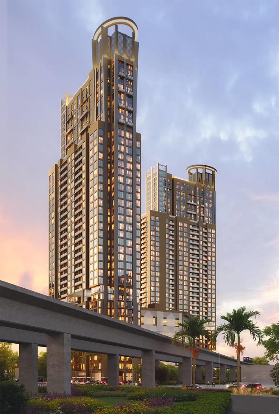 An architectural rendering shows the planned Shoma One commercial and residential project near the intersection of U.S. 1 and Bird Road and the Douglas Road Metrorail Station. The project includes two 40-story apartment towers topped by ‘halos’ that will be illuminated after dark. Shoma Group