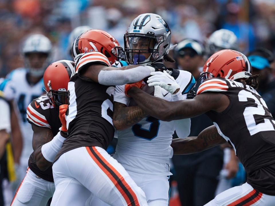 Robbie Anderson is tackled by the Cleveland Browns defense.