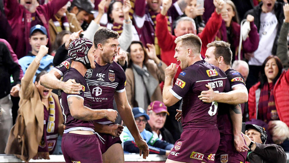 Queensland celebrate their come-from-behind win. Pic: Getty