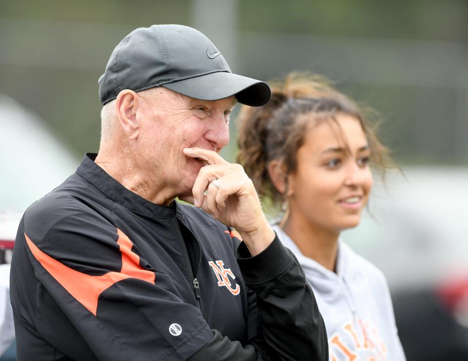 Hoover High School girls tennis coach Ryan Shaffer talks with players at Lake, Wednesday, Aug. 30, 2023.