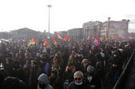 Protesters march during a demonstration against French presidential candidate Eric Zemmour, Sunday, Dec. 5, 2021 in Paris. French far right presidential candidate Eric Zemmour holds his first campaign rally in Villepinte, north of Paris. A first round is to be held on April, 10, 2022 and should no candidate win a majority of the vote in the first round, a runoff will be held between the top two candidates on April 24, 2022. (AP Photo/Michel Spingler)