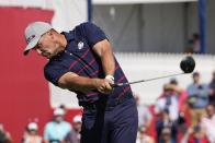 Team USA's Bryson DeChambeau hits a drive on the second hole during a four-ball match the Ryder Cup at the Whistling Straits Golf Course Friday, Sept. 24, 2021, in Sheboygan, Wis. (AP Photo/Jeff Roberson)