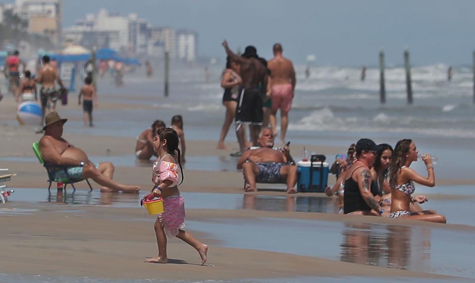 Beachgoers soak up sunshine, splash and play in the surf over Labor Day weekend in Daytona Beach. The Daytona Beach Area Convention & Visitors Bureau will be hosting a series of community tourism listening sessions starting later this month in Daytona Beach.