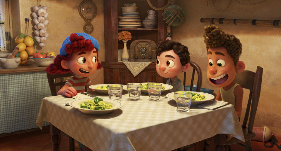 This image released by Disney shows characters Giulia, voiced by Emma Berman, Luca, voiced by Jacob Tremblay and Alberto, voiced by Jack Dylan Grazer, in a scene from the animated film "Luca." (Disney via AP)