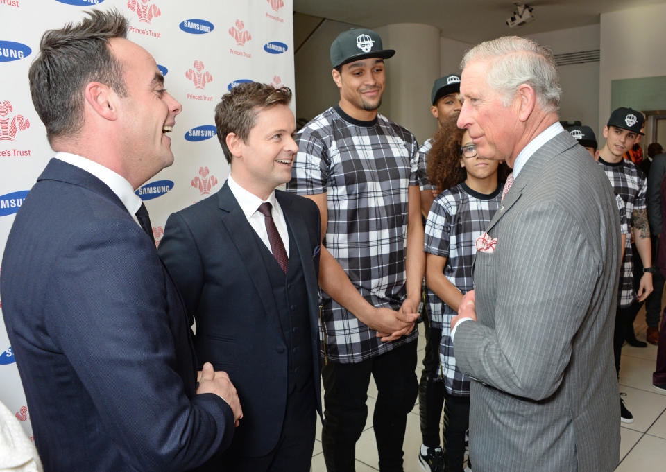 LONDON, ENGLAND - MARCH 12:  Prince Charles, Prince of Wales (R) meets (L to R) Anthony McPartlin, Declan Donnelly, Ashley Banjo and Perri Kiely attends the Prince's Trust & Samsung Celebrate Success awards at Odeon Leicester Square on March 12, 2014 in London, England.  (Photo by David M. Benett - WPA Pool/Getty Images)