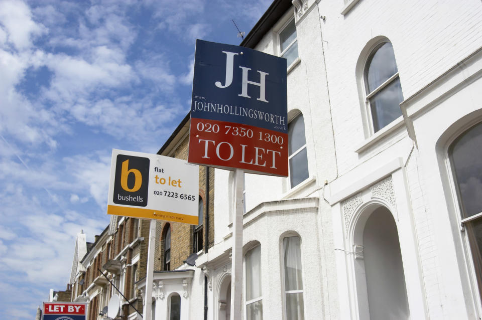 Estate Agent boards in front of houses, London. (Photo by BuildPix/Construction Photography/Avalon/Getty Images)