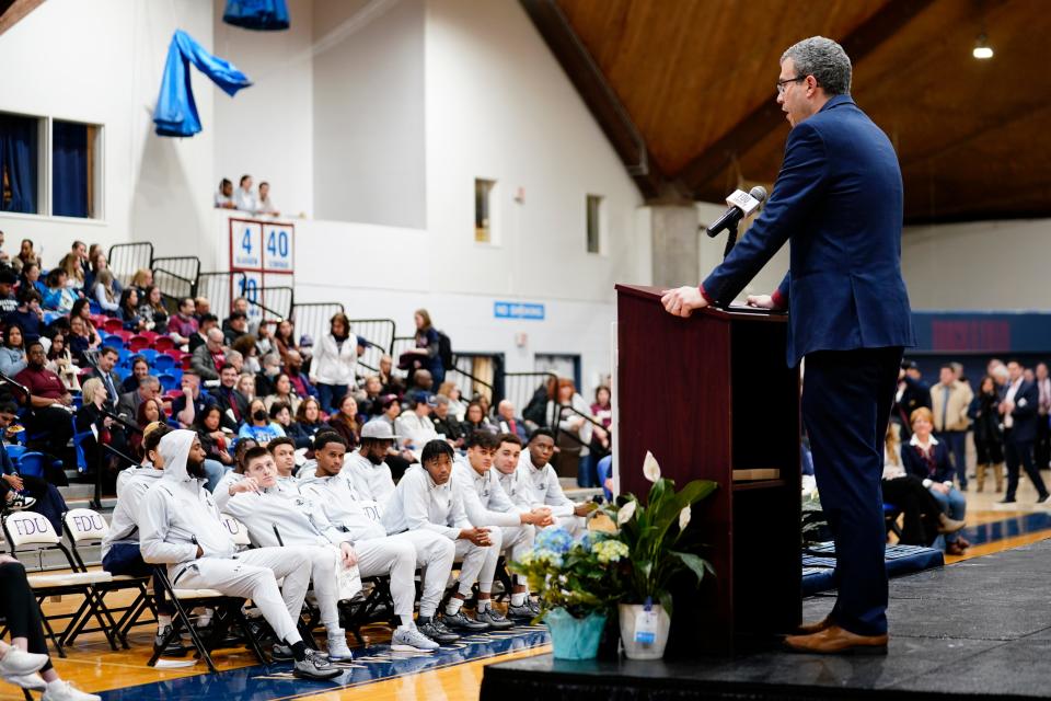 Michael Avaltroni, interim president of Fairleigh Dickinson University, speaks during a celebration for the historic 2022-23 seasons of the Knights' men's and women's basketball teams in Hackensack on March 27, 2023.