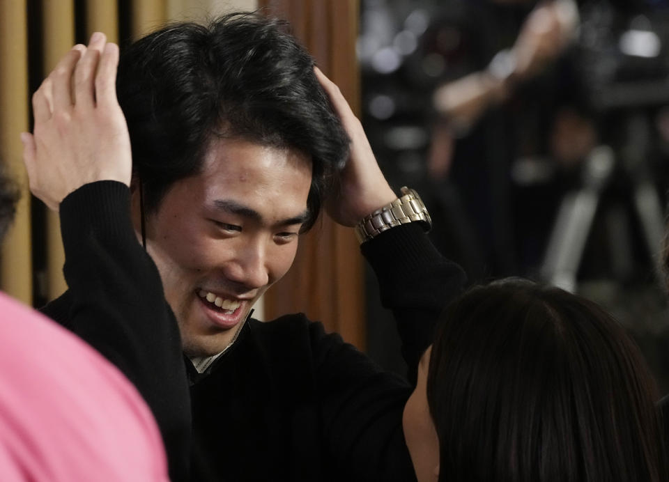 Pianist Bruce (Xiaoyu) Liu of Canada reacts after being named as the winner of the 40,000-euro ($45,000) first prize in the 18th Frederic Chopin international piano competition, a prestigious event that launches pianists’ world careers. Almost 90 pianists from around the globe took part in the 18th edition of the competition that was postponed from 2020 due to the pandemic. (AP Photo/Czarek Sokolowski)