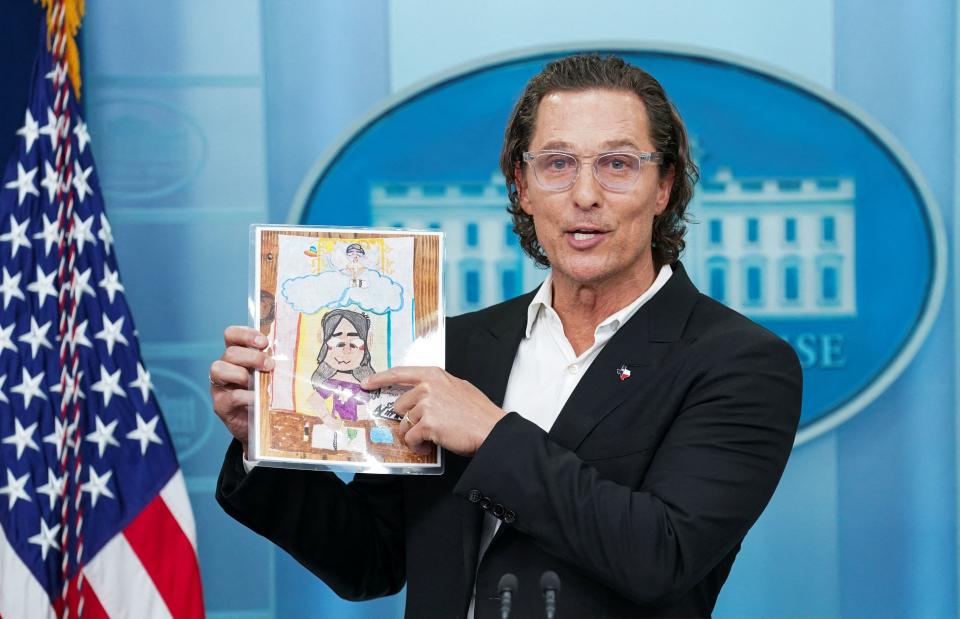 Actor Matthew McConaughey holds a drawing by 10-year-old school shooting victim Alithia Ramirez as he speaks to reporters about the recent mass shooting at an elementary school in his hometown of Uvalde, Texas, June 7, 2022. REUTERS/Kevin Lamarque