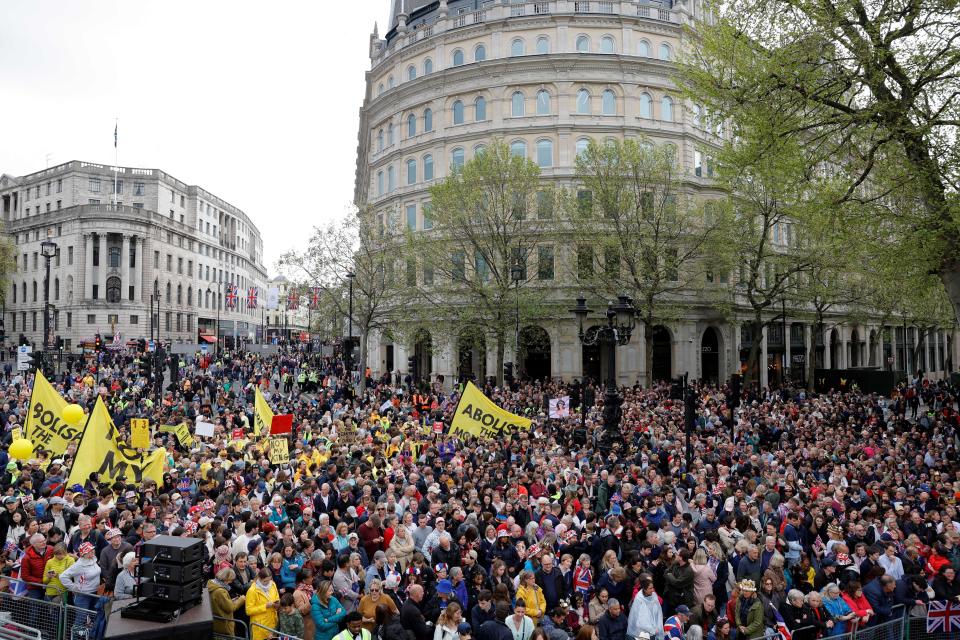 Protesters hold up placards saying 'Not My King' and 'Abolish the Monarchy' in Trafalgar Square close to where Britain's King Charles III and Britain's Camilla, Queen Consort will be crowned at Westminster Abbey in central London on May 6, 2023. - The set-piece coronation is the first in Britain in 70 years, and only the second in history to be televised. Charles will be the 40th reigning monarch to be crowned at the central London church since King William I in 1066. Republican opponents who want an elected head of state plan to protest on the day with signs declaring 