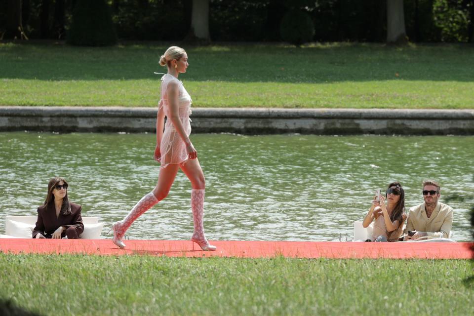 versailles, france june 26 monica bellucci l, victoria beckham and david beckham r watch gigi hadid c on the runway during the le chouchou jacquemus fashion show at chateau de versailles on june 26, 2023 in versailles, france photo by pascal le segretaingetty images