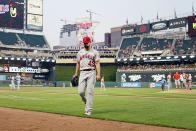 Los Angeles Angels' pitcher Patrick Sandoval heads to the dugout after he was pulled following a double by Minnesota Twins' Brent Rooker that broke up his no-hitter in the ninth inning of a baseball game, Saturday, July 24, 2021, in Minneapolis. (AP Photo/Jim Mone)