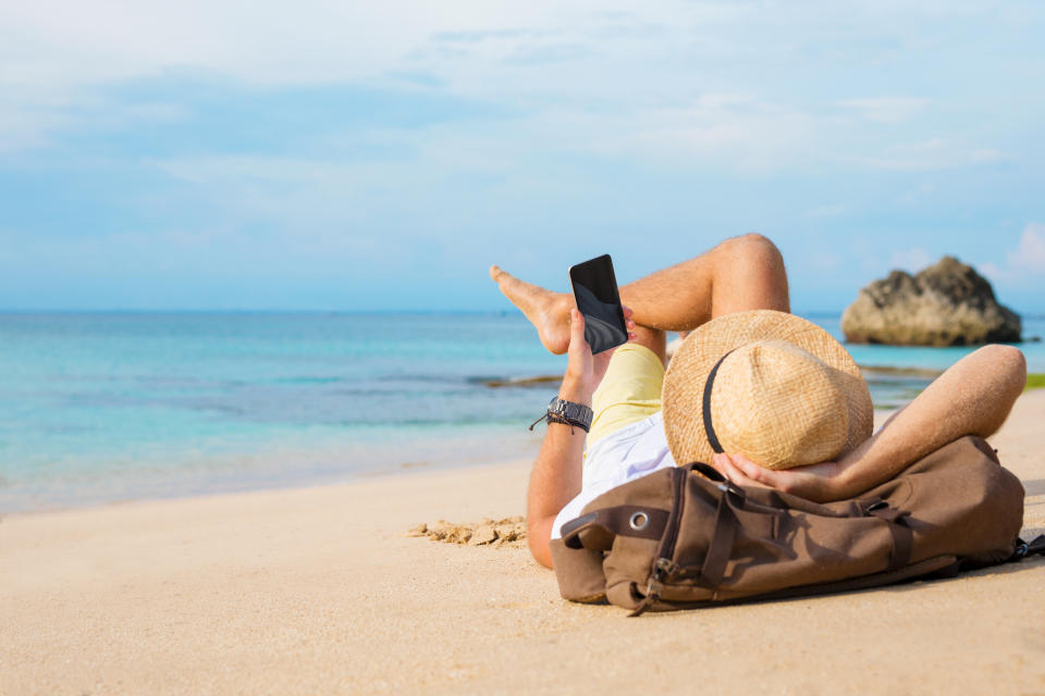 Surfen im Urlaub kann teuer werden (Symbolbild: Getty Images)