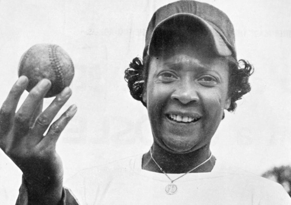 Portrait of American baseball player Toni Stone, of the Negro League's Indianapolis Clowns, as she poses with a baseball, Florida, spring 1953. Stone was the first woman to play professional baseball. (Photo by Transcendental Graphics/Getty Images)